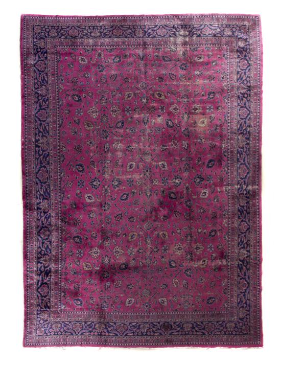 A Sarouk Wool Rug having allover 1559a8