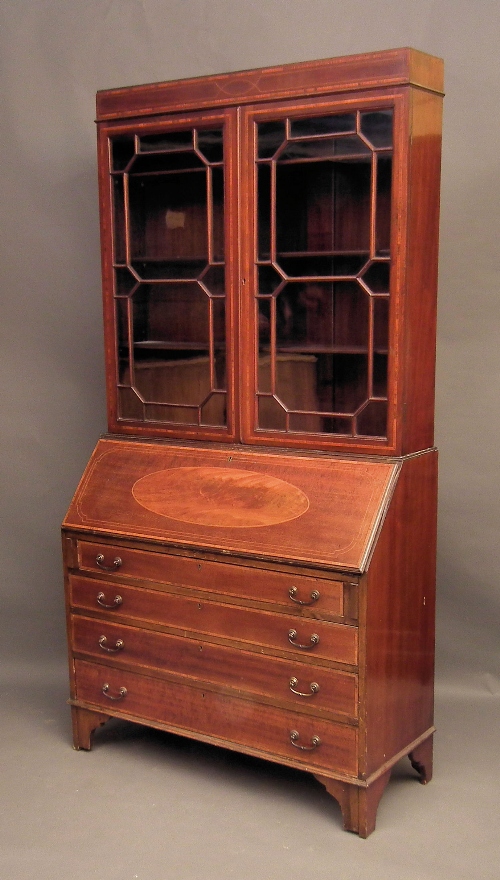 An Edwardian mahogany bureau bookcase 15d578