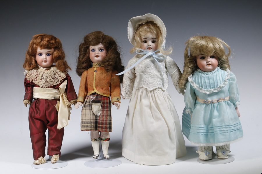  4 BISQUE HEAD DOLLS Group of 2b375b