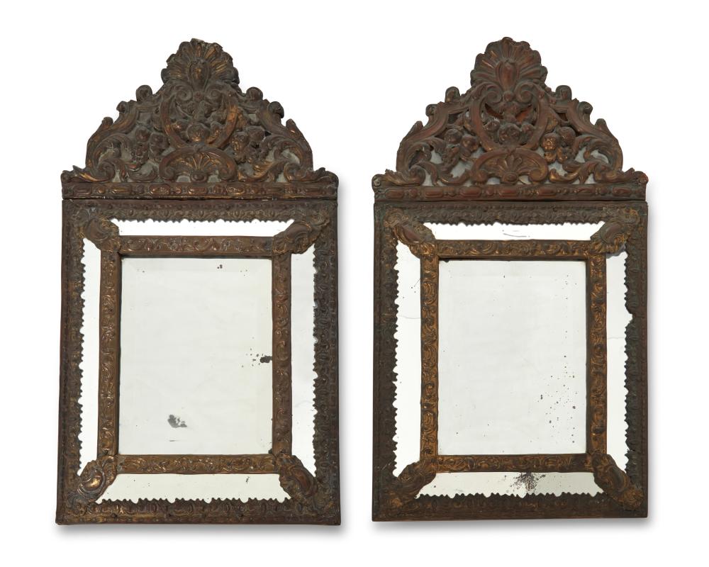 A PAIR OF REPOUSSE BRASS WALL MIRRORSA 2ee557