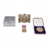 A George V prize medal    3af2eb