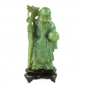 CHINESE FIGURINEA Chinese Carved
