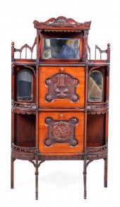 Mahogany music cabinet, crest with