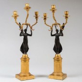 PAIR OF EMPIRE BRONZE AND PARCEL-GILT