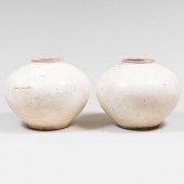 PAIR OF CHINESE EARTHENWARE CREAM