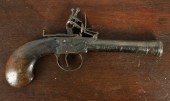 An antique flintlock pistol, with