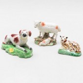 THREE STAFFORDSHIRE MODELS OF ANIMALSComprising:

A