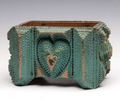 A TRAMP ART BOX WITH HEART IN TWO
