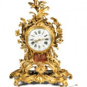 A Louis XV Gilt Bronze Mantel Clock
Jean-Baptiste