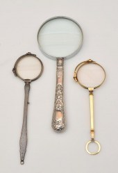 2 LORGNETTES AND 1 MAGNIFYING GLASS.
