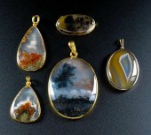 GROUPING OF FIVE MOSS AGATE BROOCHES
