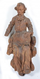 CONTINENTAL CARVED WOODEN FIGURE OF
