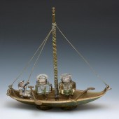 INKWELL SET IN FIGURAL BRASS BOAT WITH