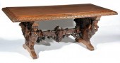 CARVED LIBRARY TABLE ATTRIBUTED TO R.J.