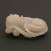 CHINESE CARVED WHITE JADE LION, 19TH