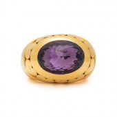 CHOPARD, YELLOW GOLD AND AMETHYST RING
Oval