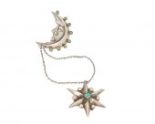 A MEXICAN SILVER MOON AND STAR CHATELAINE