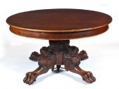 ROUND MAHOGANY TABLE WITH RUNNING CLAW