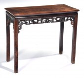 CHINESE ROSEWOOD TABLE WITH CARVED SKIRT.Chinese