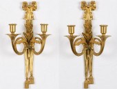 PAIR OF TWO LIGHT GILT-METAL WALL SCONCES,