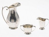 SANBURN MEXICAN SILVER PITCHER AND A