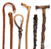 SIX CARVED CANESSix carved canes.

Condition: