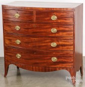 GEORGE III MAHOGANY BOWFRONT CHEST OF