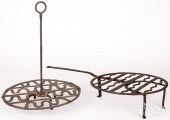 TWO WROUGHT IRON TRIVETS, 19TH C.Two