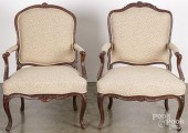 PAIR OF FRENCH CARVED WALNUT UPHOLSTERED