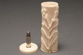 African carved ivory bud vase, and a