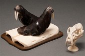 Carved ivory and onyx walrus group,