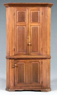 Southern Chippendale corner cupboard, one-case