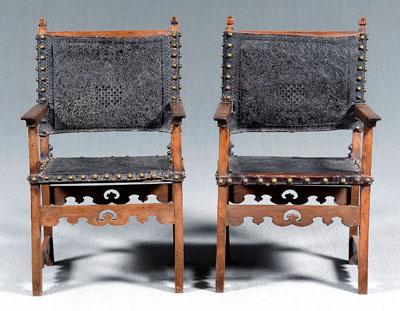 Two similar leather upholstered