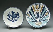 Two Delft bowls: one with interior floral