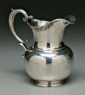Sterling water pitcher, pear form, scroll