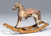 Rocking horse, horsehide covered wood