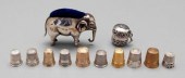 12 silver and gold sewing items: English