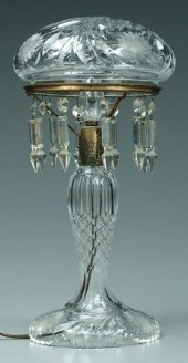Cut glass lamp, domed shade above tapered
