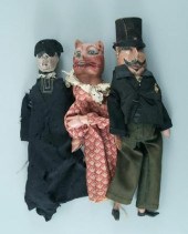 Three carved painted wooden puppets  943eb