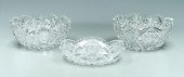 Three cut glass bowls: one with snowflakes