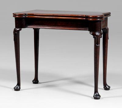 Irish Queen Anne games table, highly figured