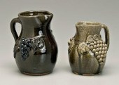 Two Meaders pottery pitchers, both with
