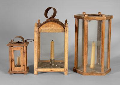 Three wooden lanterns one with 94d9d