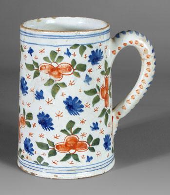 Delft tankard, polychrome flowers and leaves,