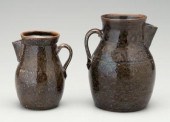 Two Georgia pottery pitchers, alkaline
