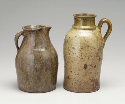 Two stoneware pitchers, both alkaline glaze: