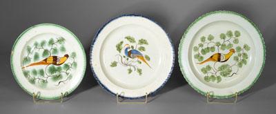 Three pearlware peafowl plates: one with