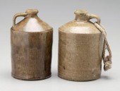 Two Timmerman stoneware whiskey jugs,