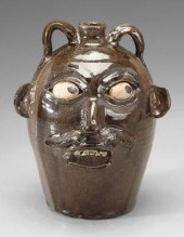 Chester Hewell stoneware face jug, painted