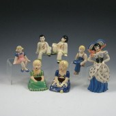 Lot of seven figurines including b3f94